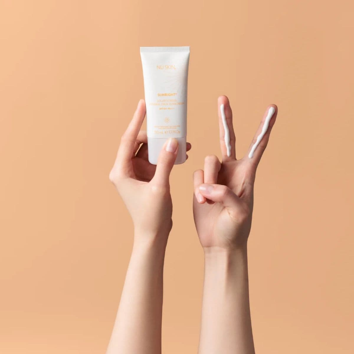 Person with sunscreen applied to face — correct sunscreen application amount